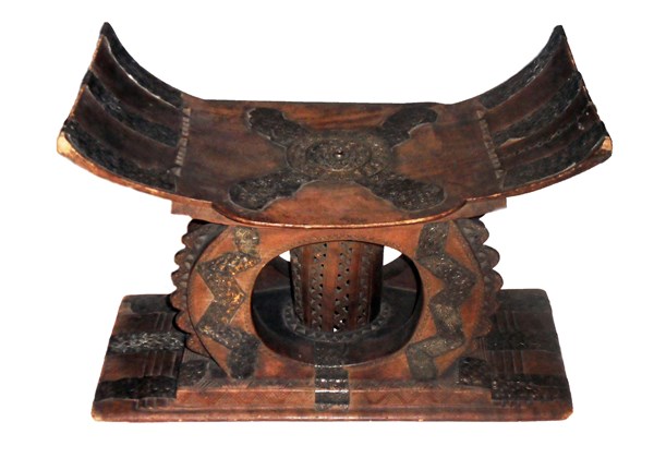 Stool - carved wood ornamented with sheet silver