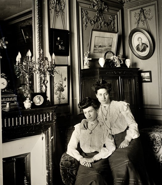 French sisters photographed in a domestic scene circa 1895