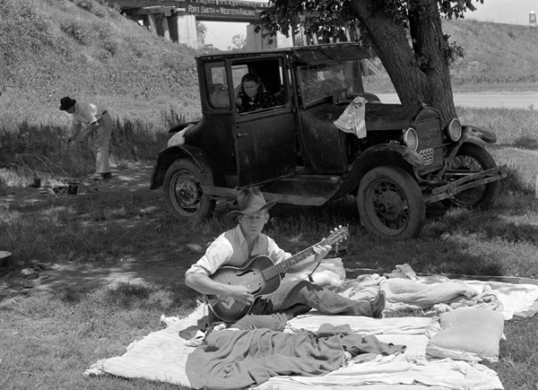 Camp of migrant workers near Prague, Oklahoma. Lincoln County by Russell Lee, 1903-1986, dated 19390101.