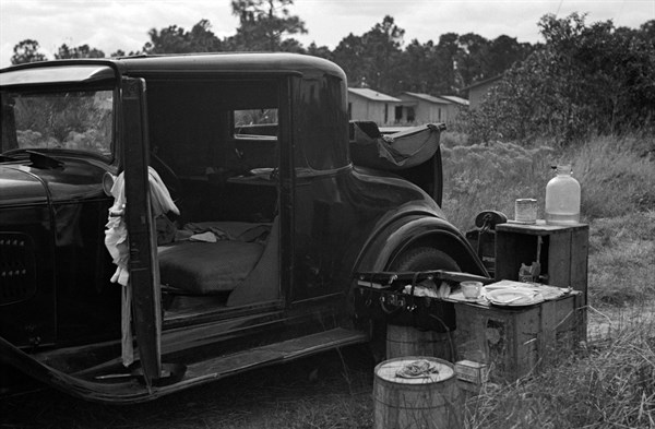 Car used by migrant agricultural workers; the rear has been fixed up as a bed, near Winter Haven, Florida 19370101.