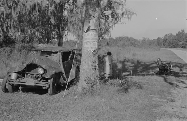 Camp of migrant cane chair maker near Paradis, Louisiana 19380101