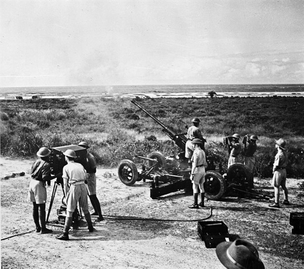 Photographic print of Bofors gun firing during target practice