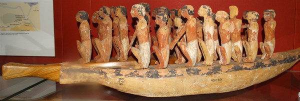 Model boat with crew of paddlers