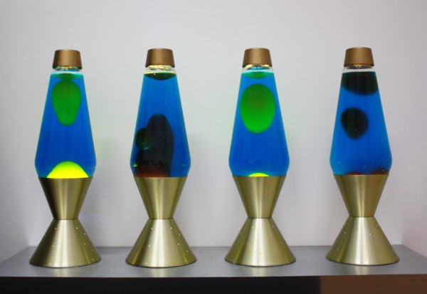 lava lamps contain blobs of coloured wax inside a glass vessel