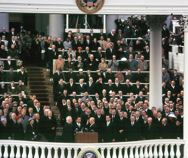 Earl Warren,swearing Dwight Eisenhower into office as President