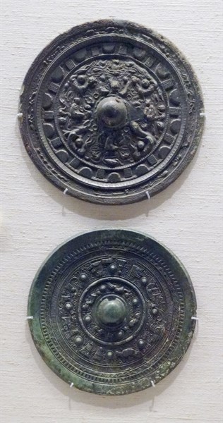 Bronze mirrors from a tomb near Miyachidake, Chikuzen, Japan