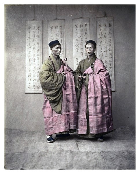 Chinese men in matching traditional dress, c, 1870s