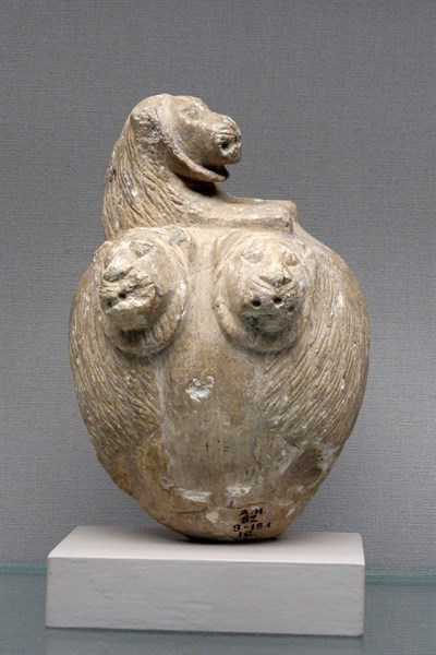 Stone mace head with lions