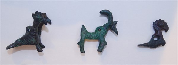 Pendants in the form of a goat