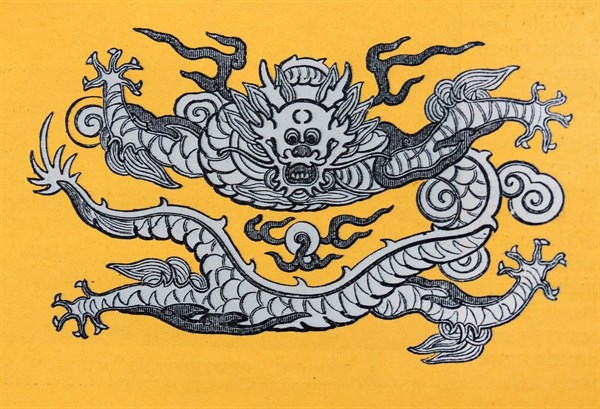 Chinese dragon emblem on a yellow background