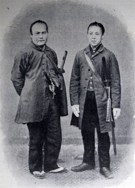 Portrait of two samurais transitioning from Old Japan to new Japan