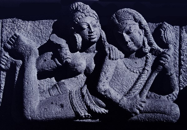 Vidyadharas floating with lotus flower.