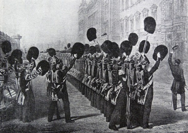 Scots Guards cheer the Queen of Great Britain