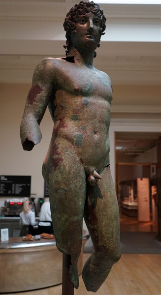 Bronze Roman statue of a young man