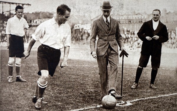 Prince Albert kicking off a football match