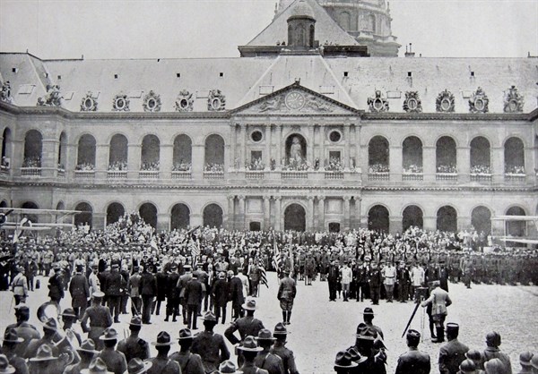 American troops march through the Place de la Concorde in Paris