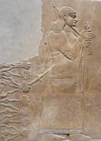 relief depicting a king and eunuch attendant
