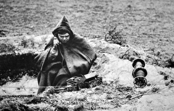 WWII: French army radio operator telephones instructions at a front line position 1940