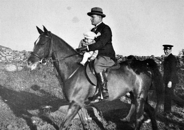 Mussolini and his last born, Roman Mussolini