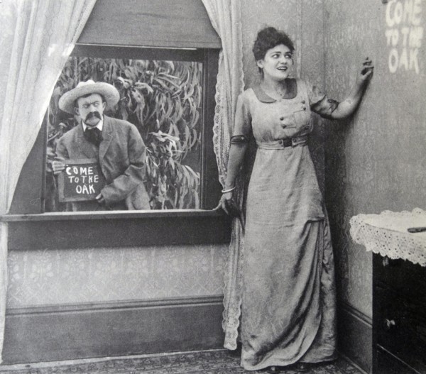 An assignation in a film entitled "Curses! They Remarked", 1914