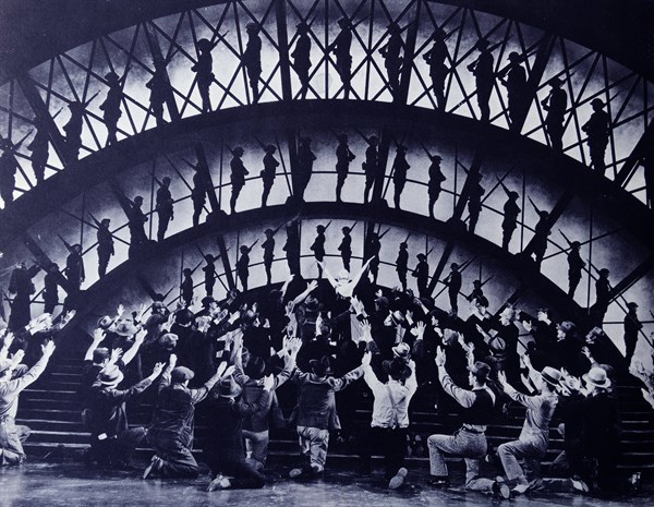 "Gold Diggers of 1933".  Joan Blondell sings "Remember My Forgotten Man" to a chorus of the unemployed, while behind her in silhouette we see the same men when they were fighting in WWI for the countr...