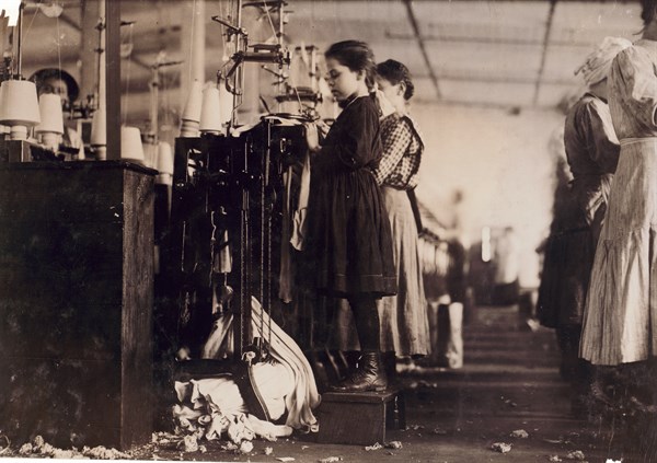 Photograph of a young girl employed as a knitter