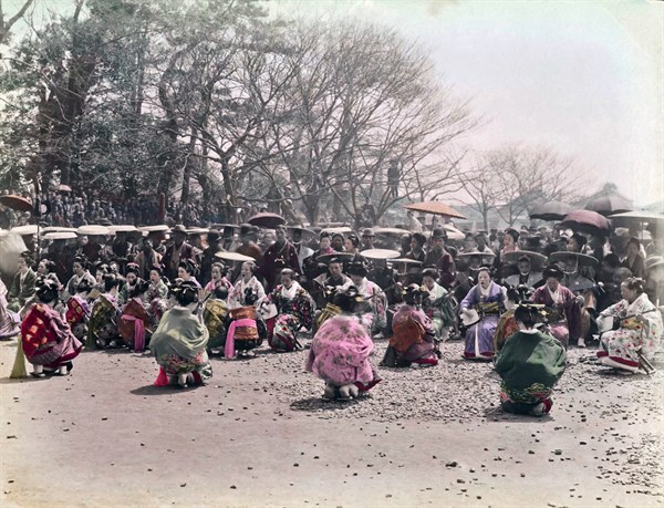 Colour photograph of Japanese Women in Kimonos dancing