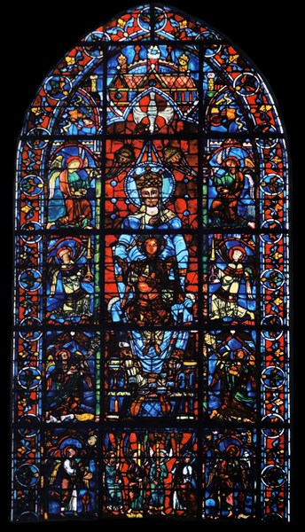 window from the South Choir aisle in Chartres Cathedral, France. Shows The Virgin Mary with the infant Christ