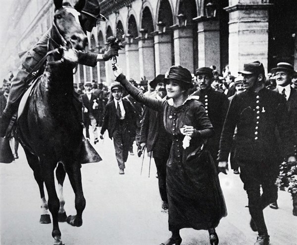 Photograph of an American Officer being greeted in the Rue de Rivolli, Paris during World War One 1918