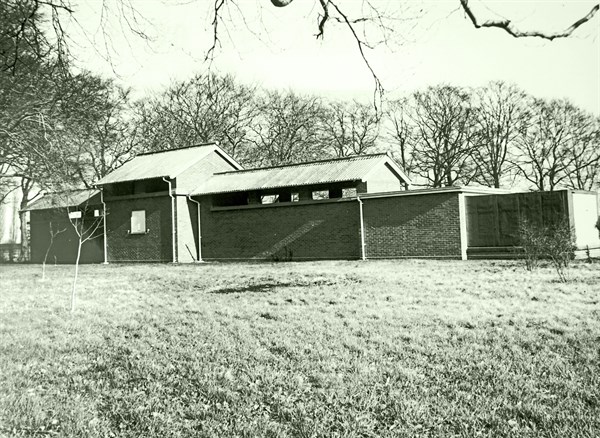 Photograph of a building housing a horizontal solar tower as part of the Cambridge University observatories