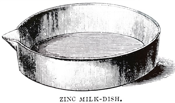 A zinc milk dish in which the cream was allowed to rise