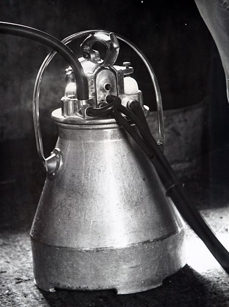 Photograph of an electric milking machine