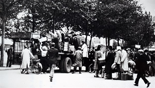 Refugees in Paris, during the liberation of France, 1944