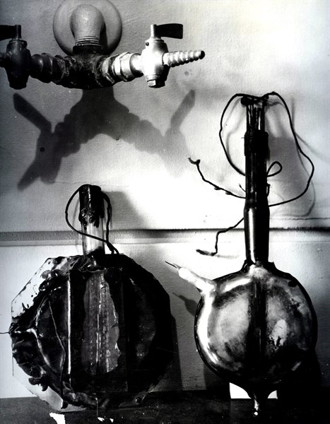 Photograph of the first two cyclotron models designed by Ernest Lawrence