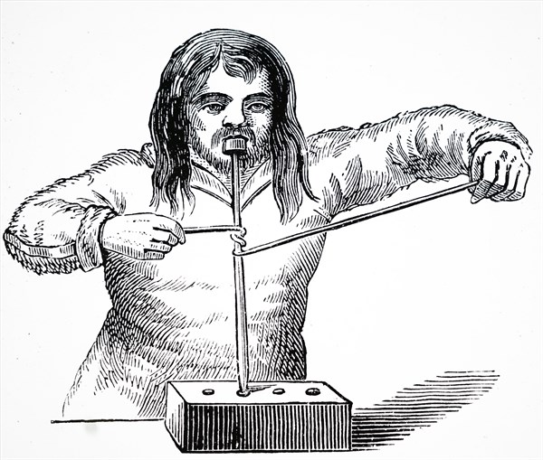 A bow drill, a prehistoric form of drilling tool, which was used to produce fire