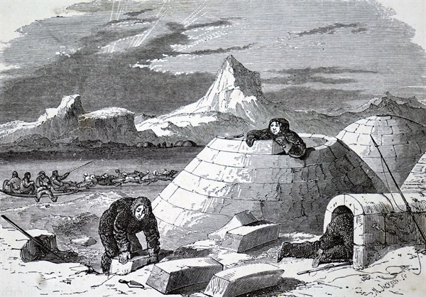 An Eskimo making an igloo