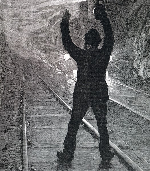 A man trying to stop a train during an emergency