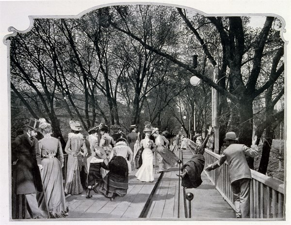 Photograph of the moving pavement, showing a woman falling off.