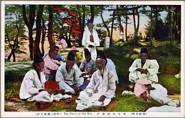 A gathering of elderly men for a picnic. Korea