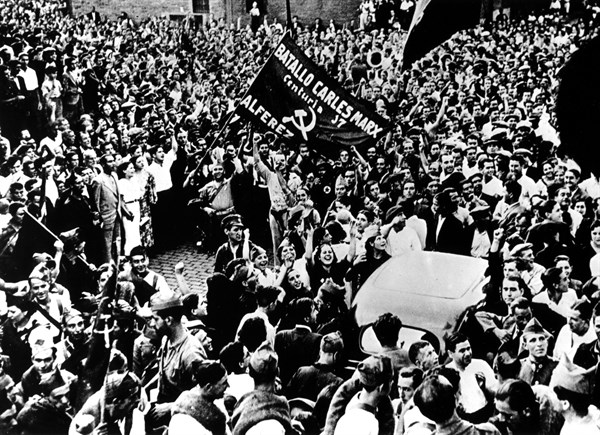 The Karl Marx Battalion acclaimed by the people, 1936