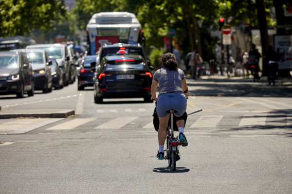 Bicycles and cars in Paris