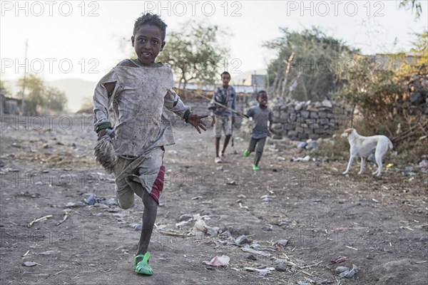 Children running on the street