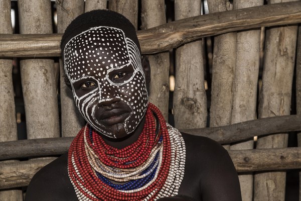 Young woman with painted face