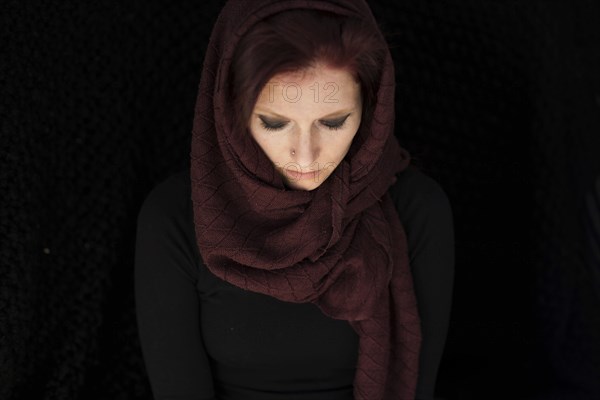 Woman with cloth on her head