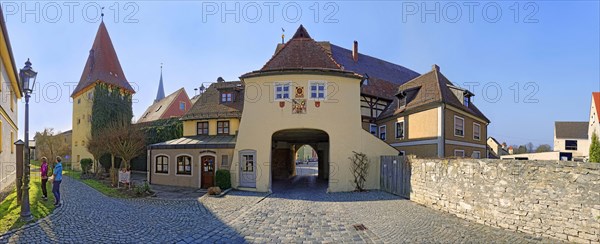 Old city wall with gate