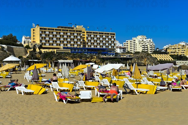 Tourists sunbathing at Rocha Beach