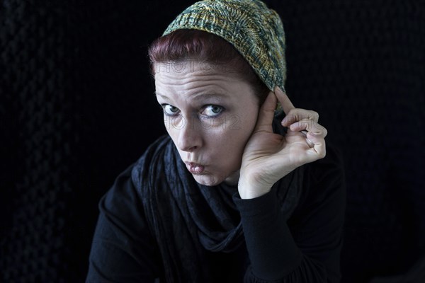 Woman with green wool hat