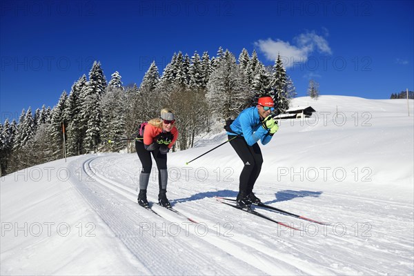 Olympic silver medalist Tobi Angerer with his wife Romy on the cross-country ski trail of Winklmoos-Alm