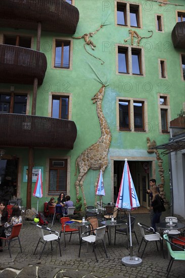 Facade with giraffe figure