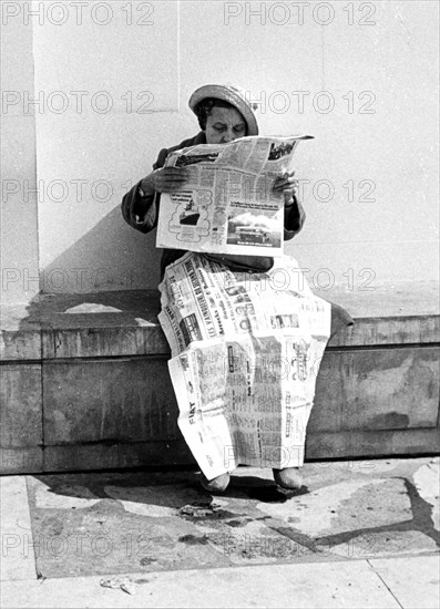 Newspaper as blanket
